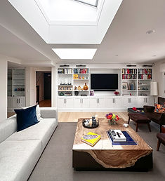 A neutral taupe rug in the living room space of this home in Bedford, New York