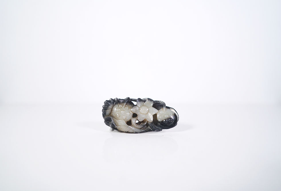 Thumbnail: A Celadon and Black Jade Carving of Two Lotus Seed Pods with a Stand