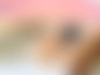 A woman lying back on a lounger dreaming