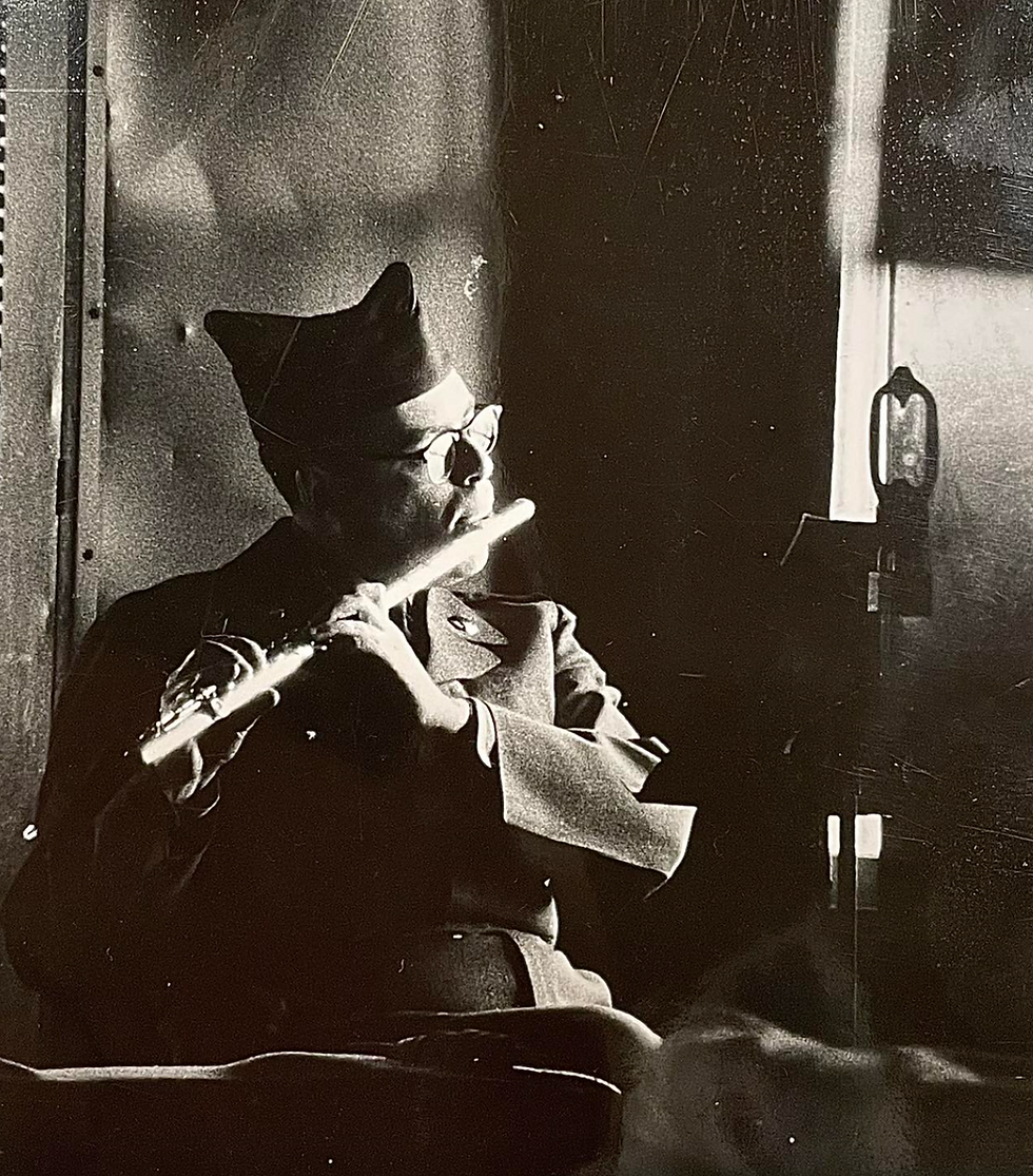 Corporal Buzz Brauner keeping his flute chops up in the Fort Dix barracks. Tommy Dorsey had his vacated tenor sax chair waiting for him after his discharge from the service.