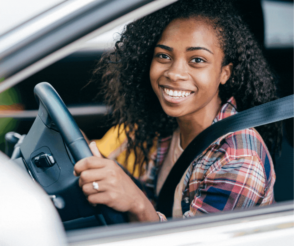 A lux driver smiling