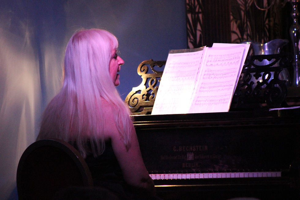Carol Anne Wells at the Criterion's grand piano