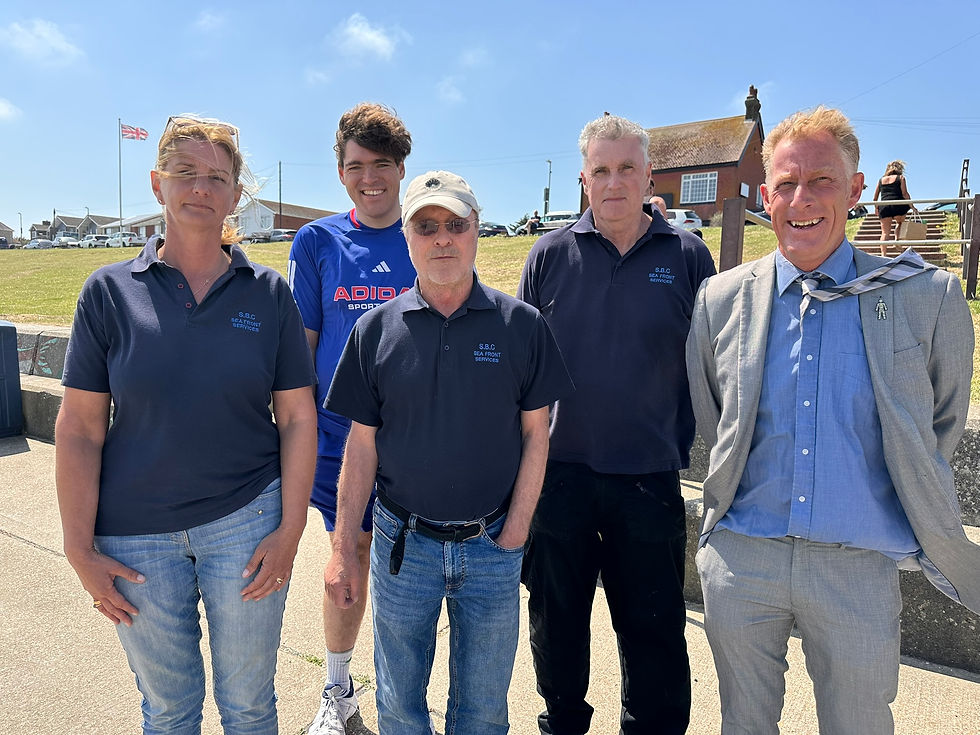 Tim Arnell, right, and his team of beach cleaners at The Leas, Minster