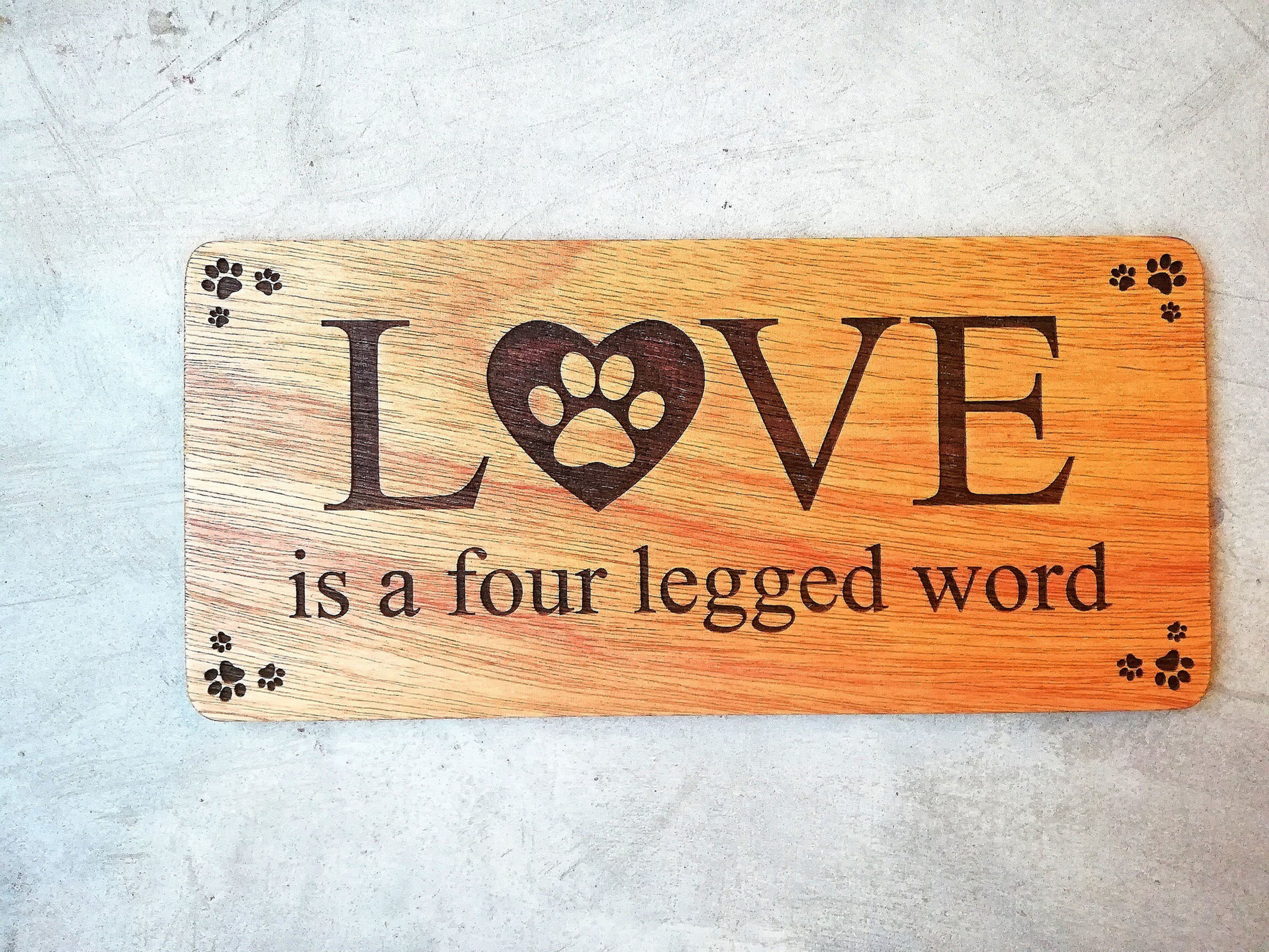 CARVEGLOW® "Love is a four legged word" Sign for Home