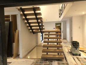 The Elegance and Innovation of Metal Floating Stairs: Transform Your Home with Our Custom Designs