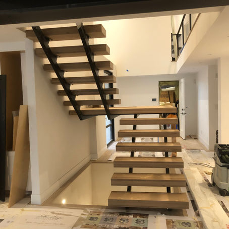 The Elegance and Innovation of Metal Floating Stairs: Transform Your Home with Our Custom Designs