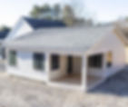 A white, energy-efficient home addition in Hollis, New Hampshire built by Sypher Design Build to bring a family closer together.