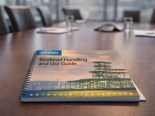 photo of an NREL Biodiesel Handling and Use Guide on a conference room table