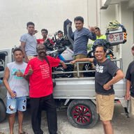 Day 051 - A Team Effort for an Arduous Task: Loading Motorbike into Container for Shipment to Darwin