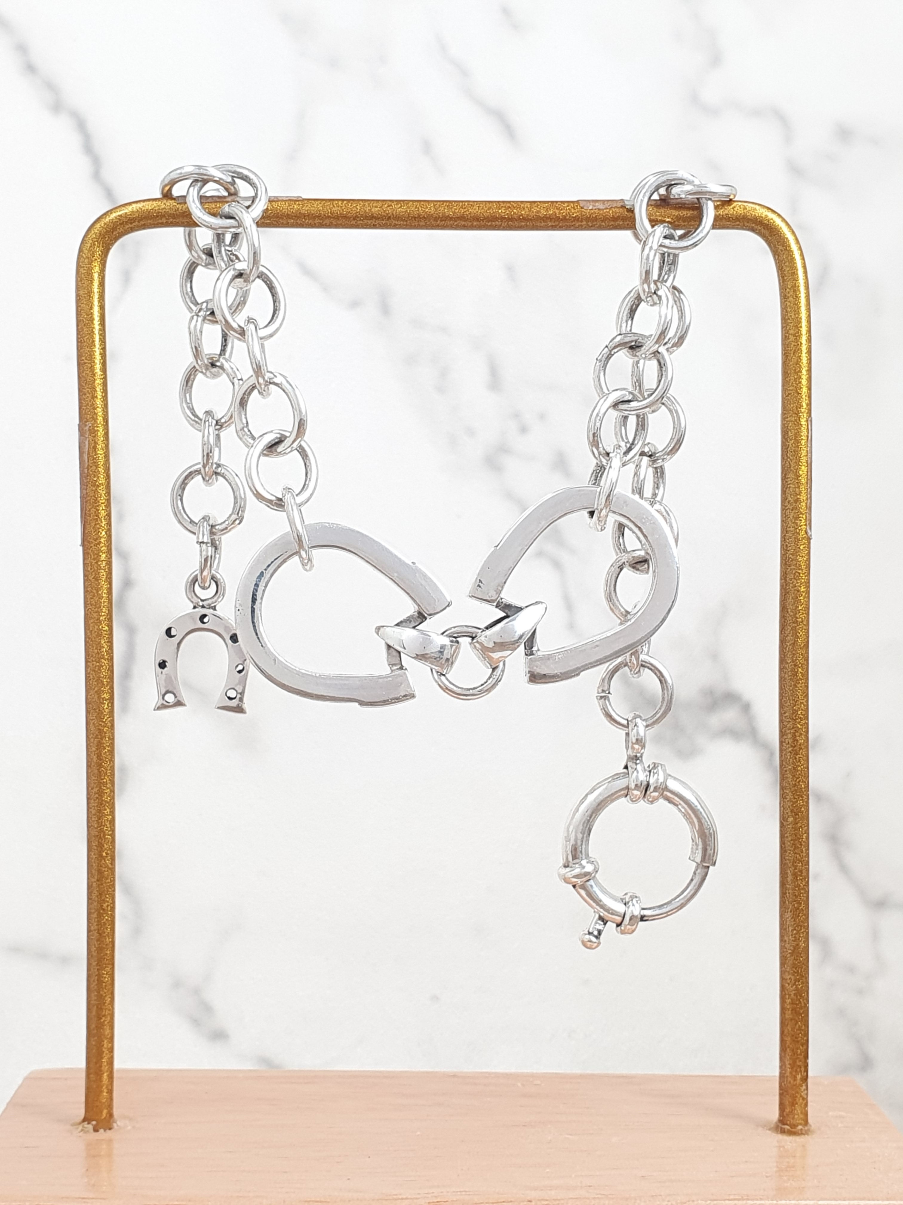 Sterling Silver bracelet with double hoofprint charm | BL227798