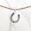 Thumbnail: Sterling silver equestrian horseshoe charm | CH557209