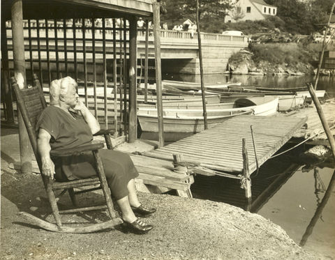 091 Nellie in Rockin Chair next to pier with boats 1200 dpi JPEG.jpeg