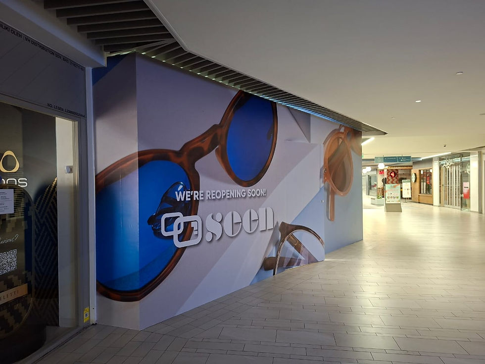 Completed hoarding and visual installation at One Utama for Seen Eyewear