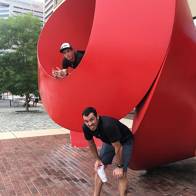 Players hunt for items in the Baltimore scavenger hunt tour with 3Quest Challenge