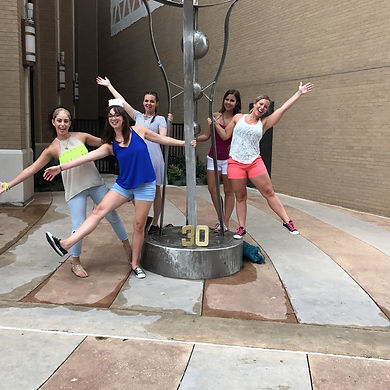 Players hunt for items in the Dallas scavenger hunt tour with Operation City Quest