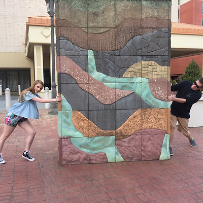 Players hunt for items in the Little Rock scavenger hunt tour with Wacky Walks