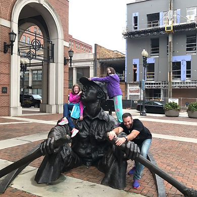 Players hunt for items in the Knoxville scavenger hunt tour with Operation City Quest