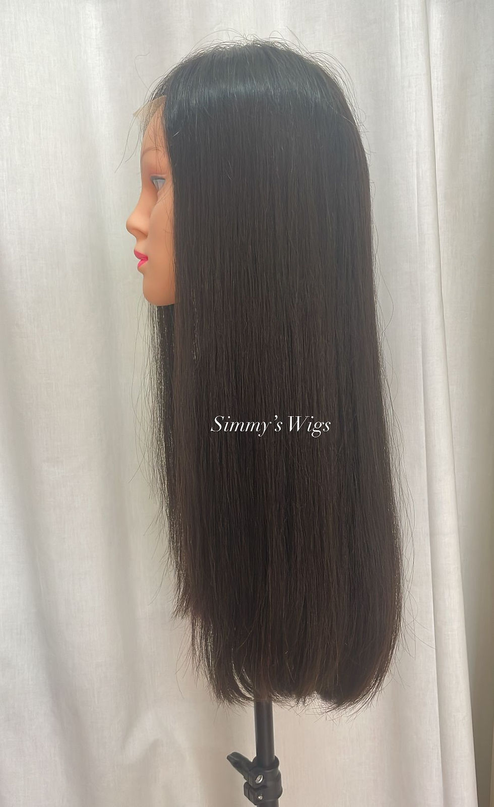 Thumbnail: Simmy's Wigs dark brown human hair wig, straight and sleek, on mannequin head.