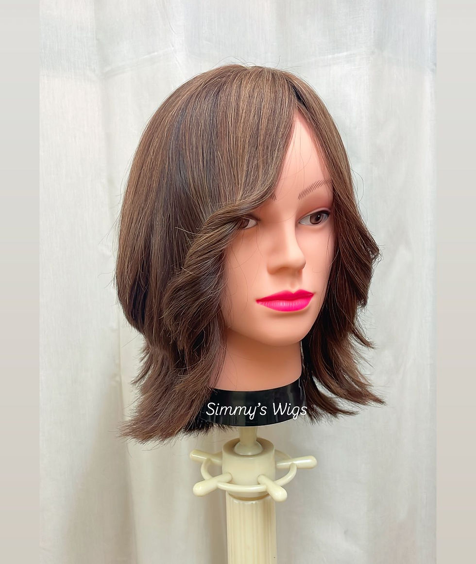 Mesh closure, Simmys London human hair wig with longer side fringe