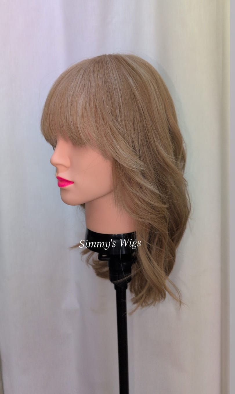 Thumbnail: Simmy's Wigs mannequin wearing a golden blonde wig, 15H- Skin Top Simmys London European Human Hair Wig Golden Blonde.