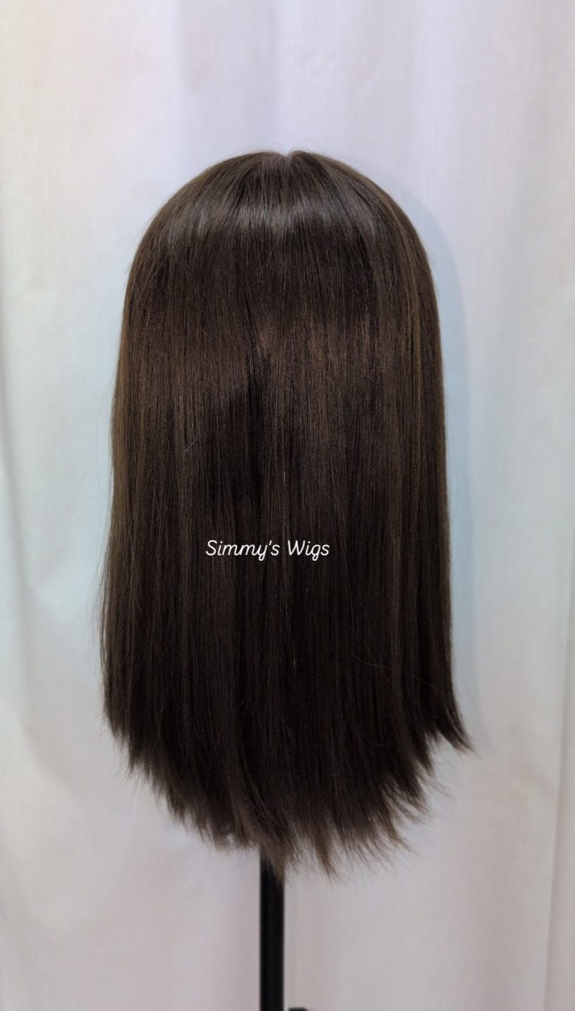 Thumbnail: Simmy's Wigs logo on dark brown hair, human hair wig for versatile styles.