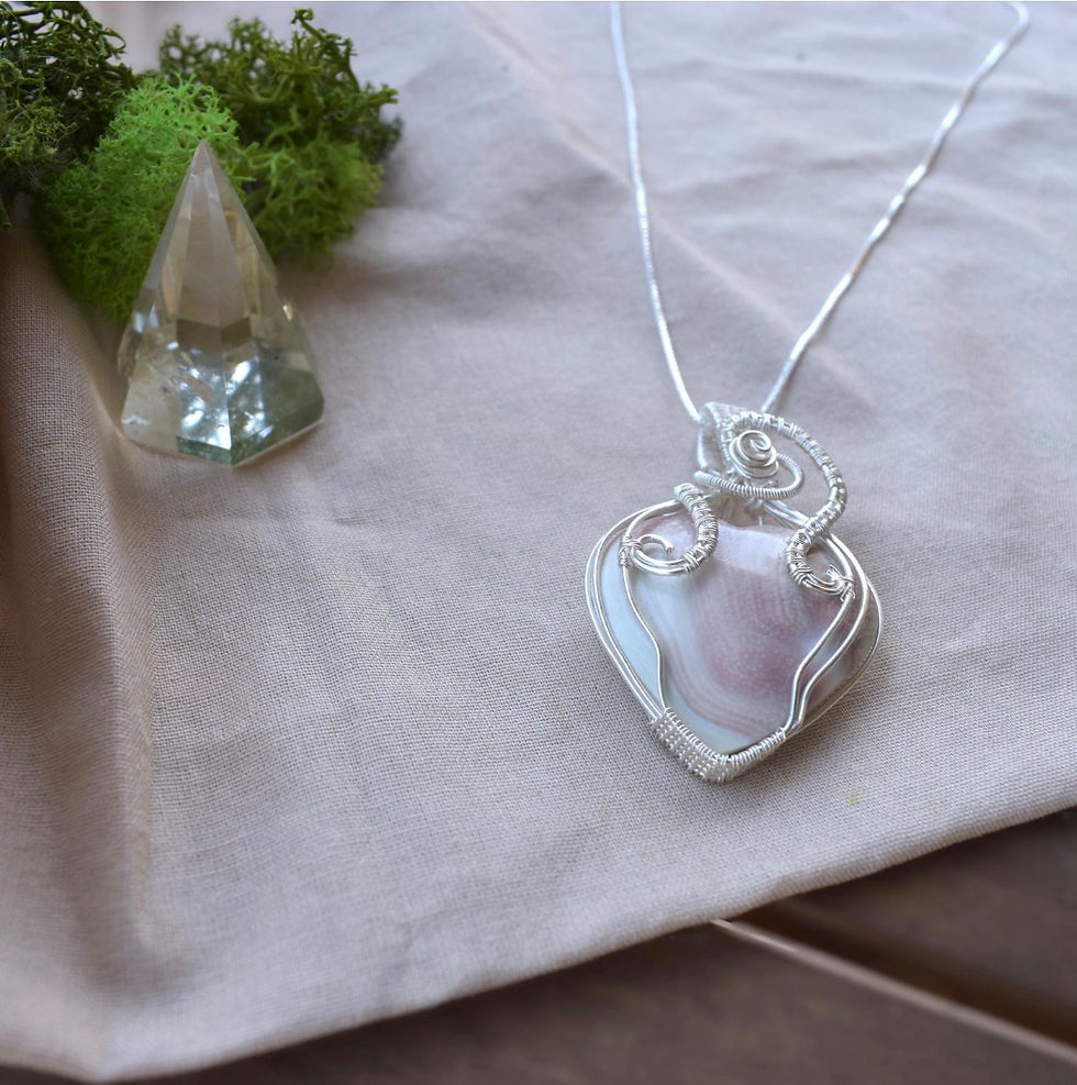 Thumbnail: Quiet Devotion - Wire Wrapped Heart Shell Pendant. 