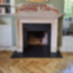 Bespoke limestone surround with slate hearth and slips