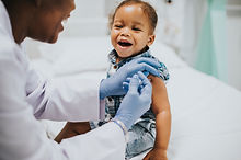 toddler-getting-vaccination-by-pediatrician.jpg
