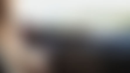 someone steering a driving wheel