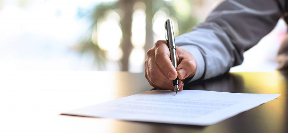 Man signing Tesla Contracts