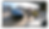 Tesla Live Sentry Mode camera view with microphone button for exterior speaker communication