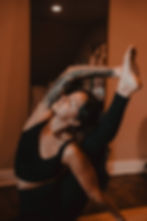 woman practicing yoga ritual in compass pose