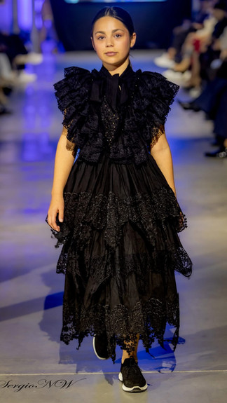IMC MODEL: Maria Almeida wearing By Vel on the runway
