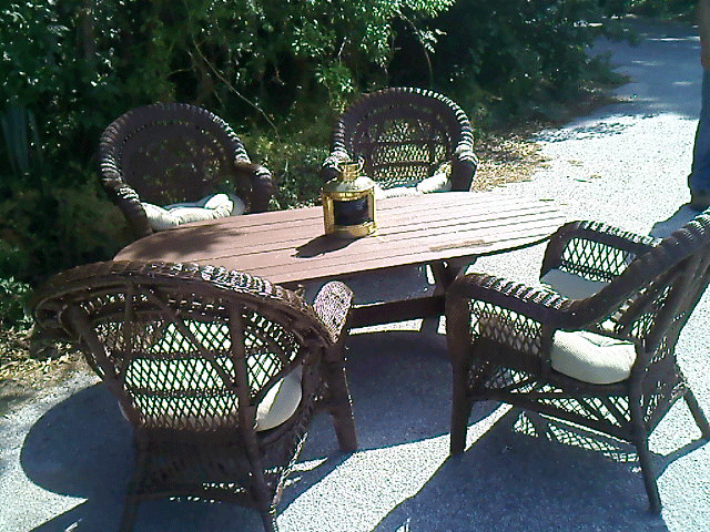 Brown Wood Planked Table and Chairs