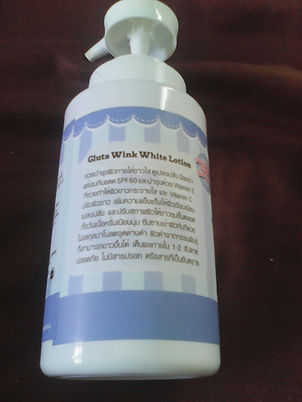 Back view of the bottle Gluta wink white lotion back view