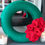 Thumbnail: Green Wool Wreath with Red flowers