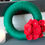 Thumbnail: Green Wool Wreath with Red flowers