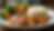 Eye-level view of a balanced meal with chicken, rice, and vegetables