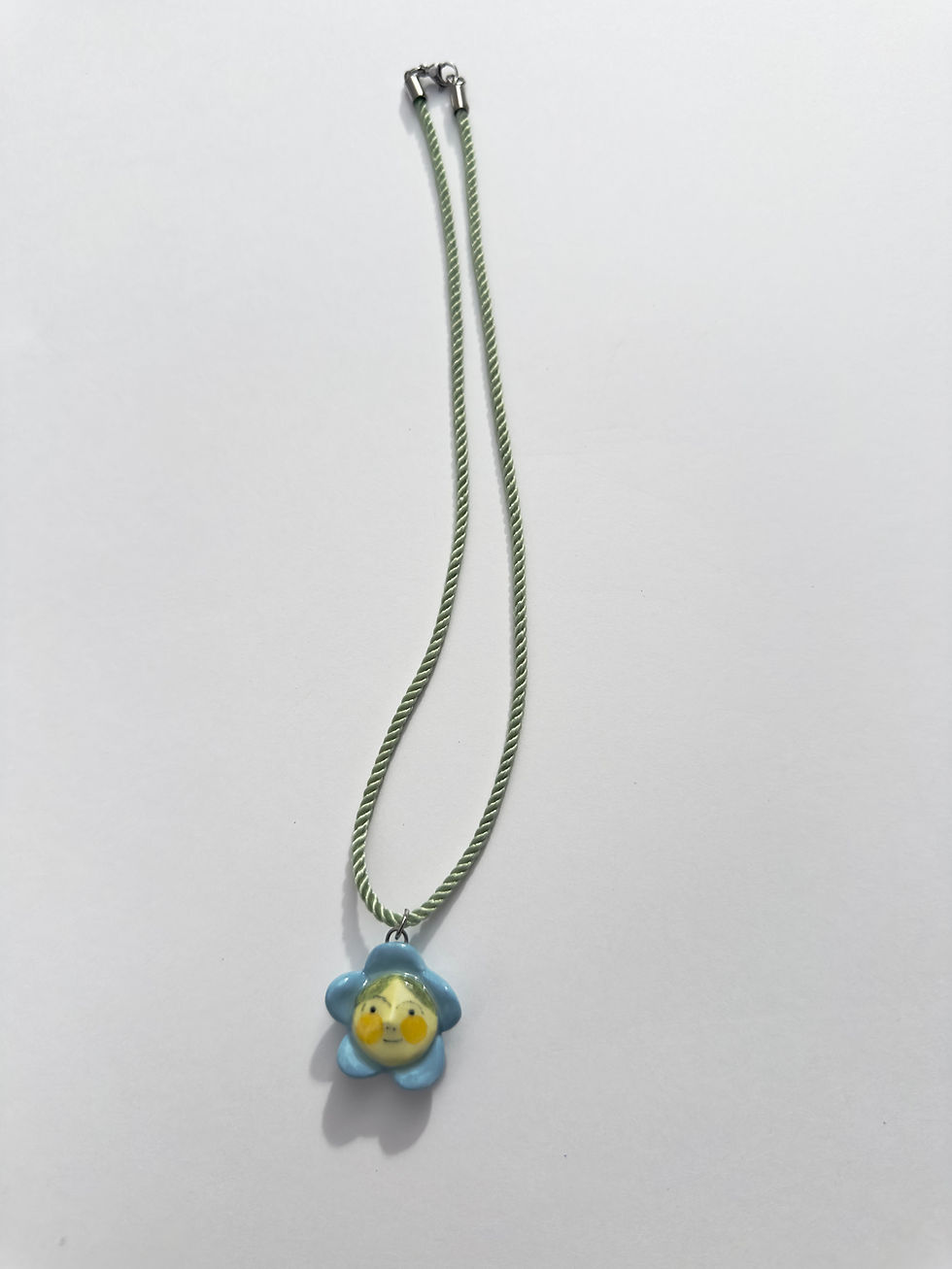 Thumbnail: blue flower baby