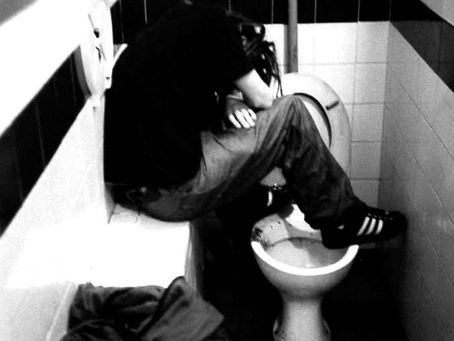 Music Photography behind the Toilet Door