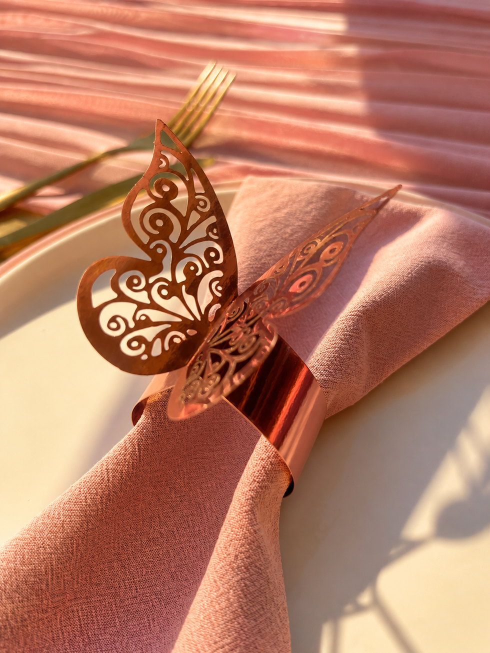 Soft pink elegance with butterfly details