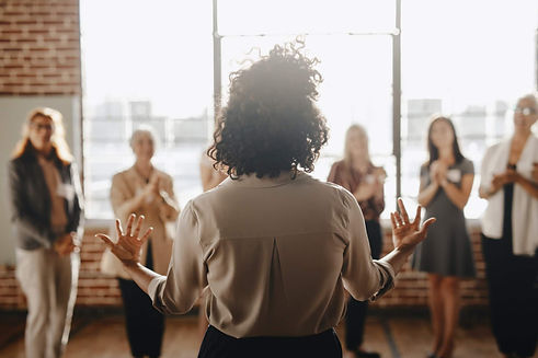african-american-female-empowering-other-colleagues-in-workplace.jpg