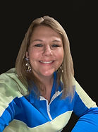 Portrait of Owner sitting smiling Founder Creative Director of Zenith Majestic Shoppe