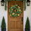 Thumbnail: Green & Gold Poinsettia Wreath with Lights