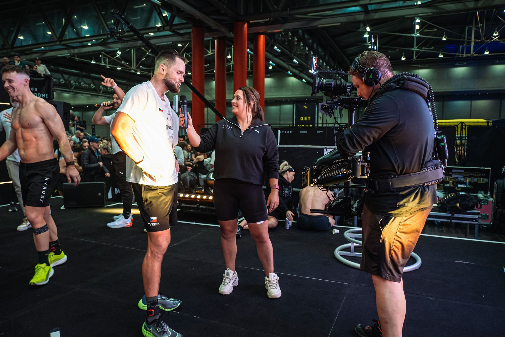 Lauren interviewing athletes