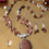 Thumbnail: Gold Sun Stone Braided Necklace And Earring Set