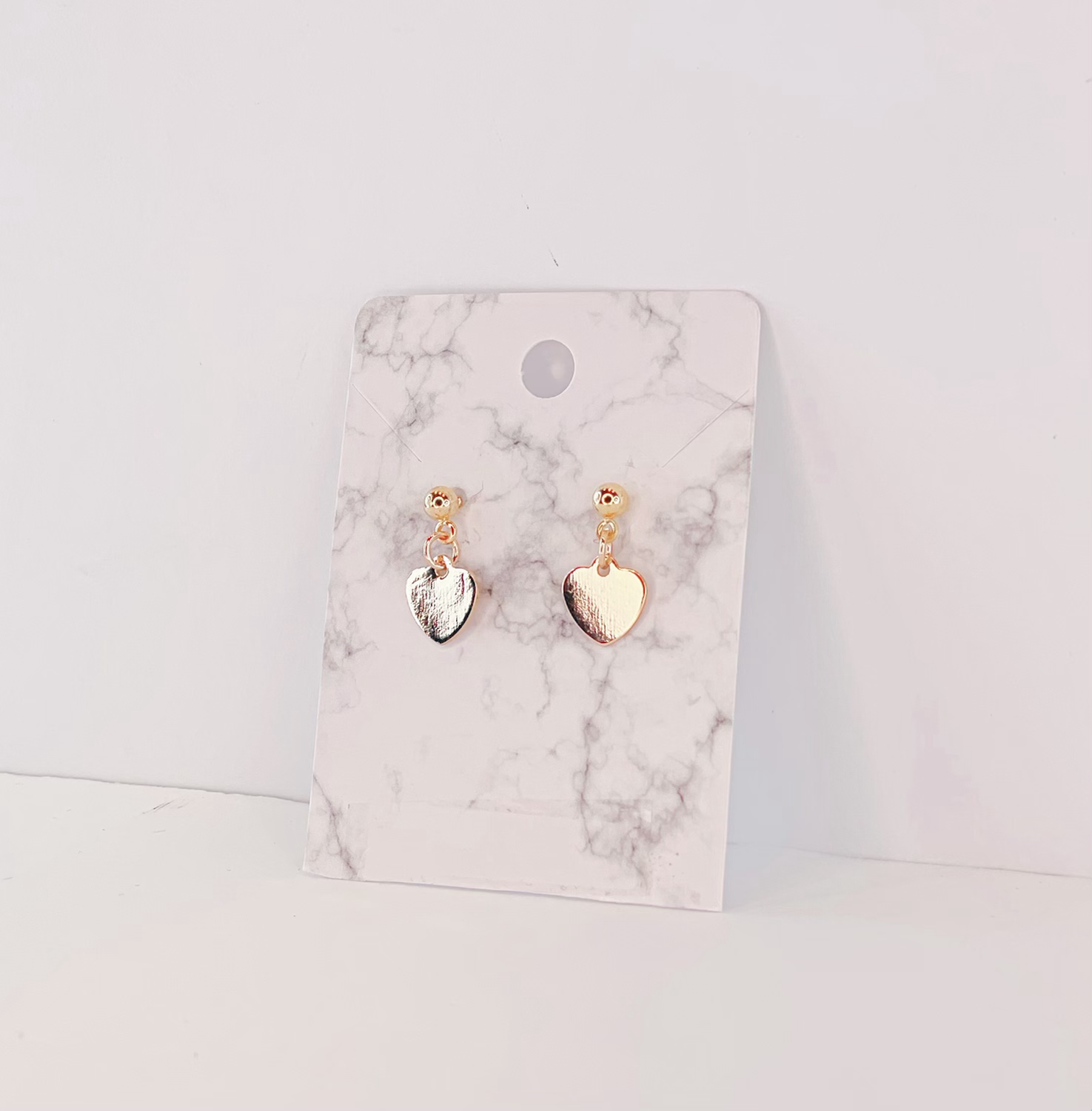 Gold heart studs 