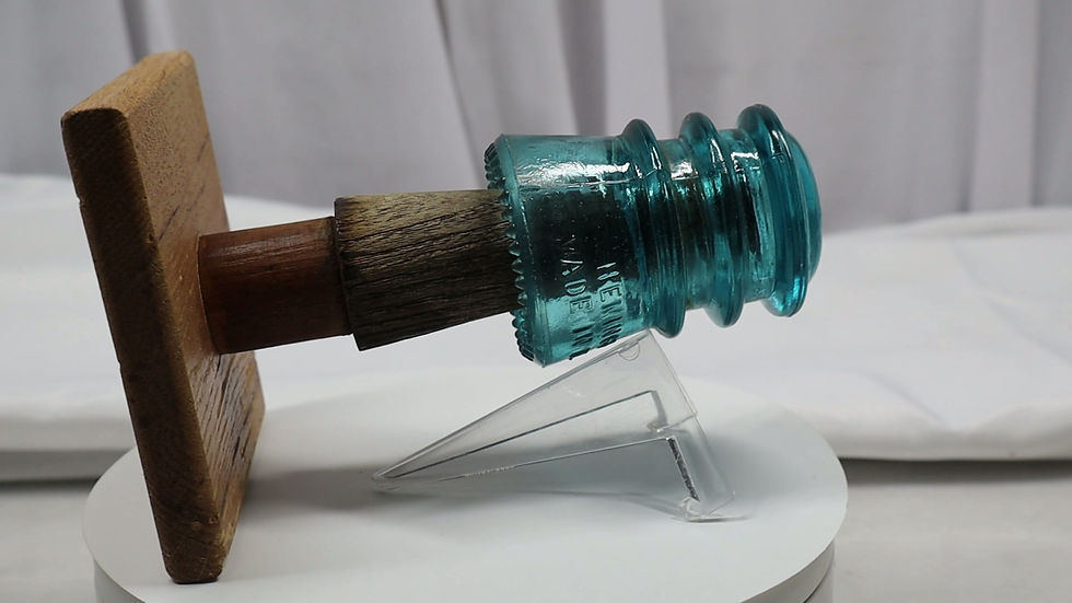 Thumbnail: Glass Insulator Wall Hook mounted on its original threaded wood post.