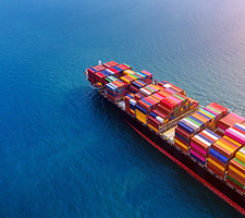 aerial-view-of-container-cargo-ship-in-sea.jpg