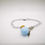 Thumbnail: Bracciale chiama angeli smaltato azzurro strass arancione
